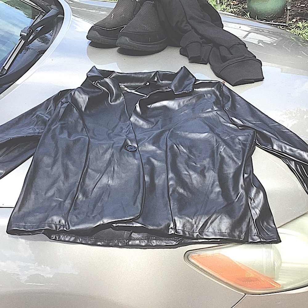It’s lovely, one button, black leather dress jacket